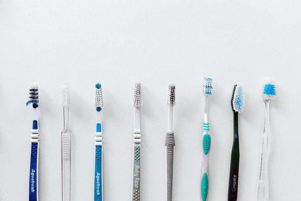 Eight toothbrushes in a line. Learn more on our blog.