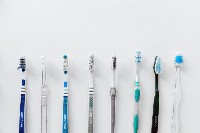 Eight toothbrushes in a line. Learn more on our blog.